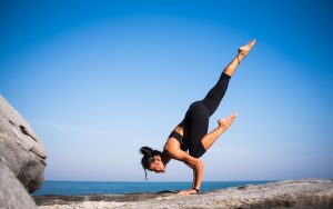 Girl doing yoga.