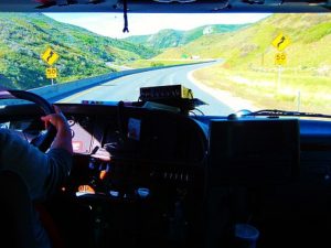 Long distance moving companies Springdale - Man driving a truck 