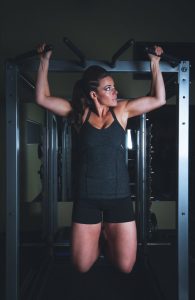 A girl training on a machine