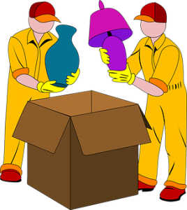 Men packing cardboard box