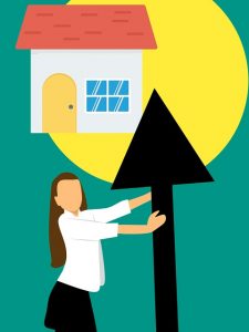 A good agent increasing the value of property, like this realtor holding an upward arrow.