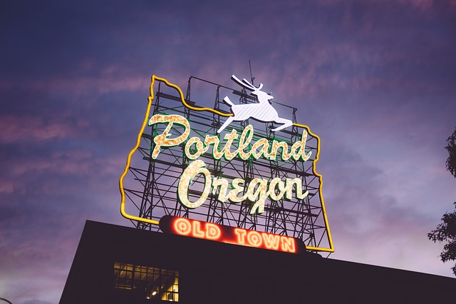 A sign that says Portland, Oregon, Old Town.