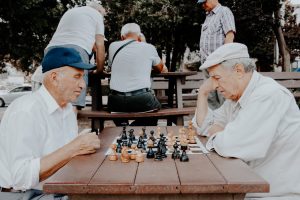 elderly playing chess