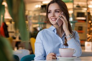 A woman calling long distance moving companies Middletown.