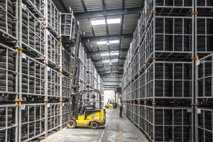 Long distance moving companies Aurora - forklift in the storage