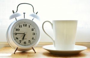 clock and cup of coffee in Tulsa