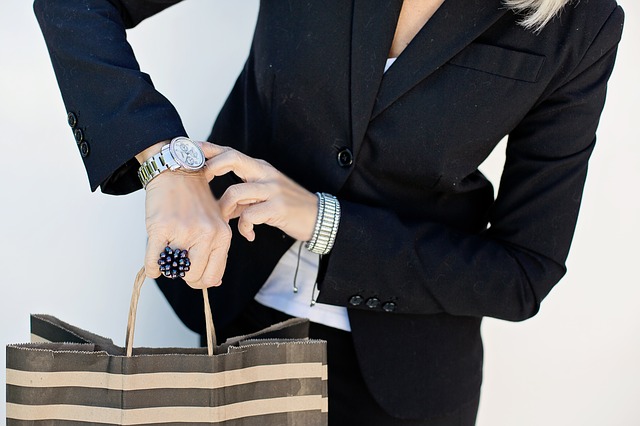 Woman looking at a wrist watch