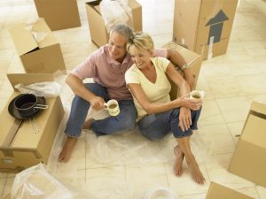 long distance moving companies Lincoln - older couple with moving boxes