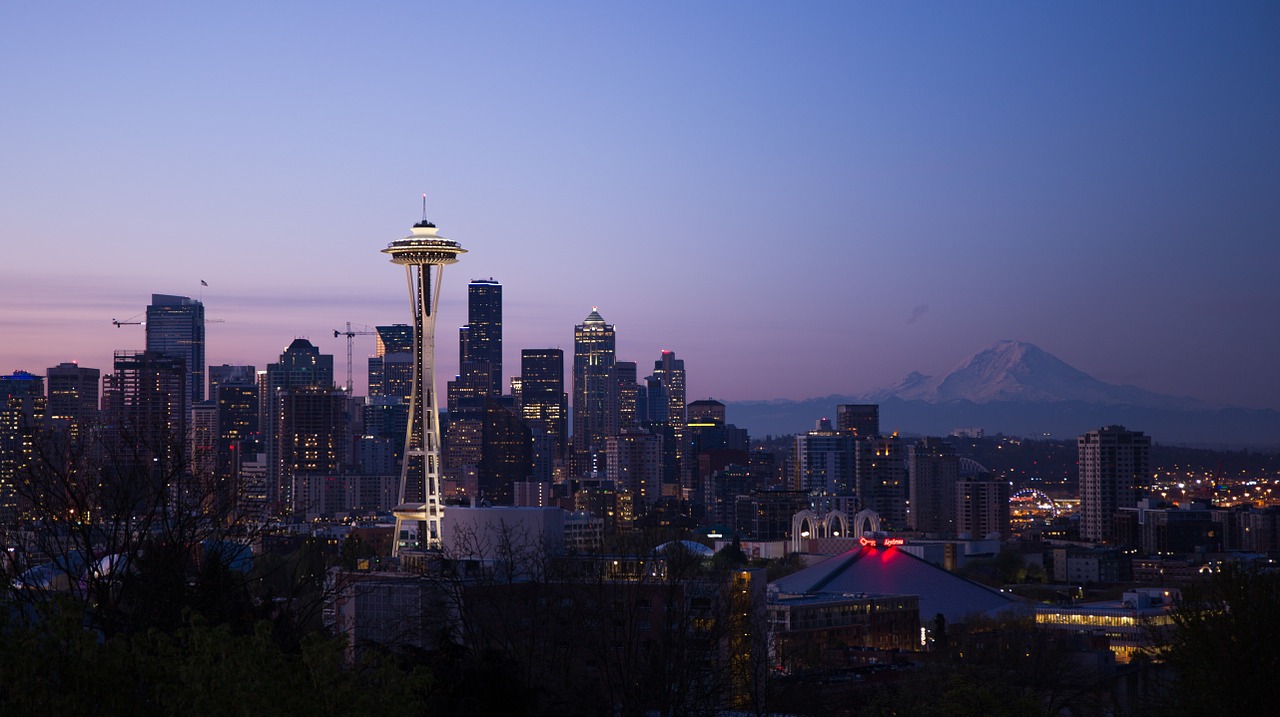 A landscape of Seattle with Space Needle in the forefront.