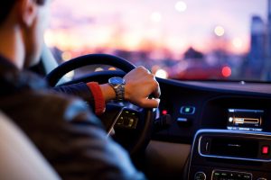 A man driving his car