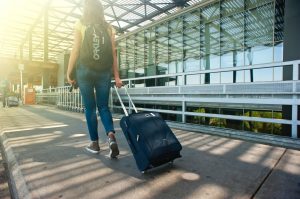 A girl draging her suitcase