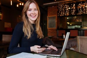 A girl looking at some relocation advice