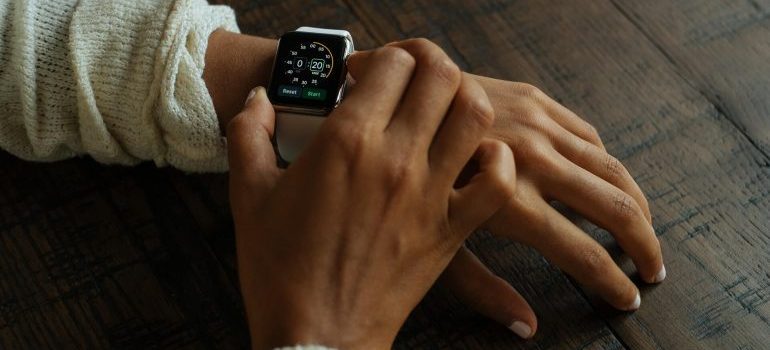 A woman looking at her watch