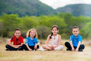 Four children sitting