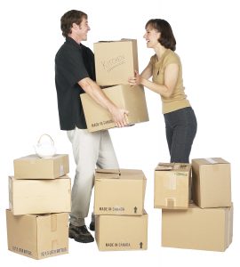 people with packed boxes moving from Seattle to San Diego