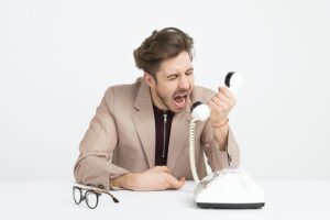 Man screaming on the phone