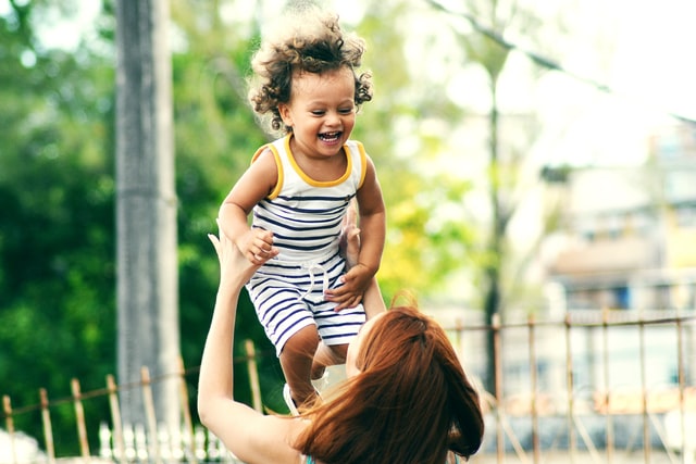 Mom and a child having fun after moving from Anchorage to Seattle