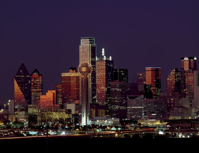 Dallas skyline in the night that you can enjoy after moving from Illinois to texas