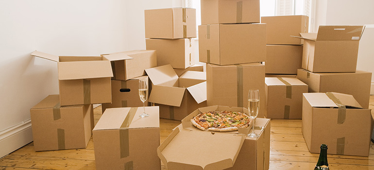 fun packing experience with many moving boxes, pizza and champaign