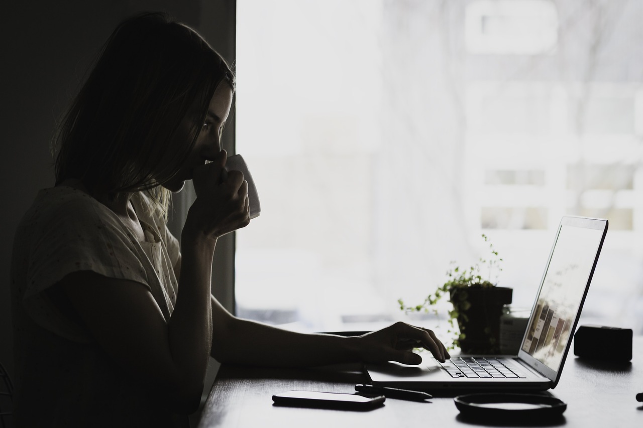 woman doing research before moving from Reno to San Diego