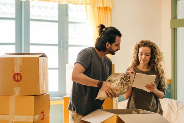 couple with moving boxes