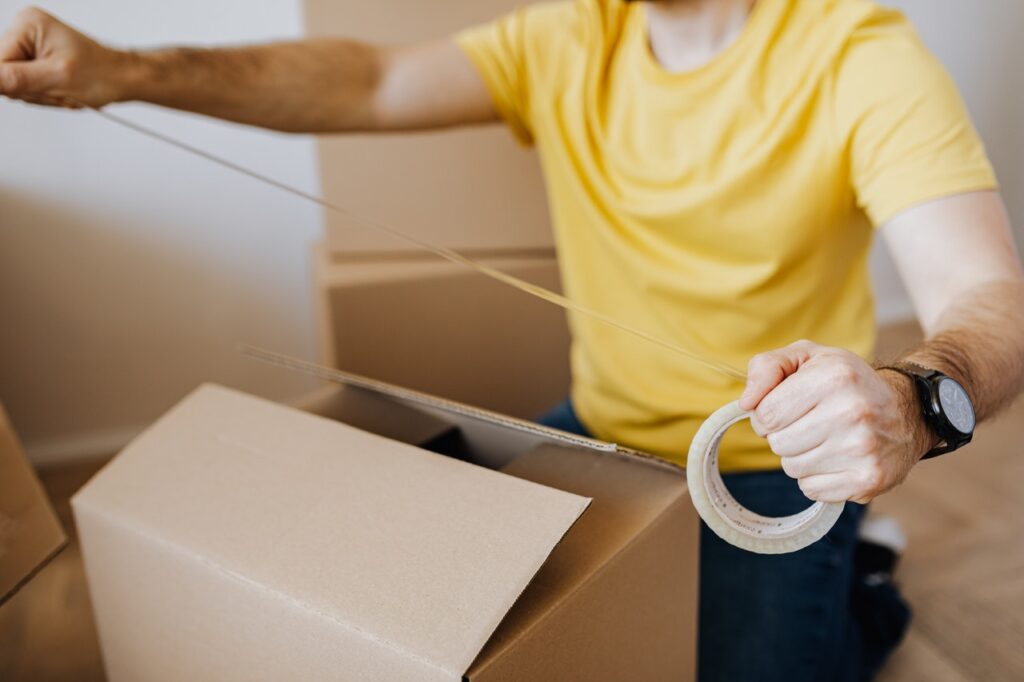 Man packing a box
