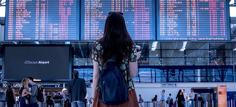 A girl on an airport, moving from Montana to Florida