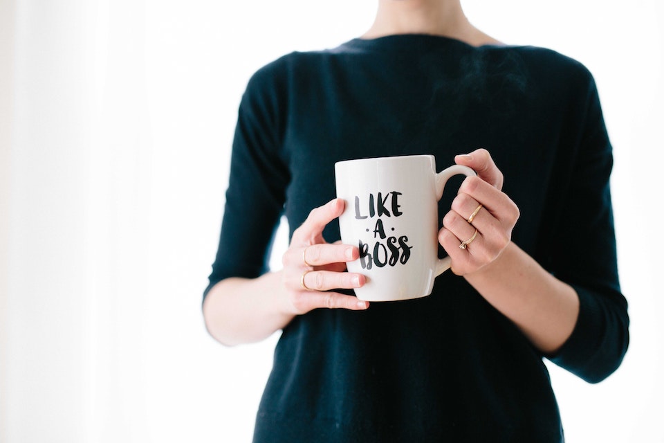 a girl with a mug