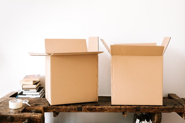 Cardboard boxes sitting on atable