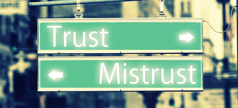 sign saying trust and misstrust