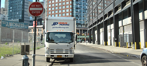 jp urban moving truck on the road