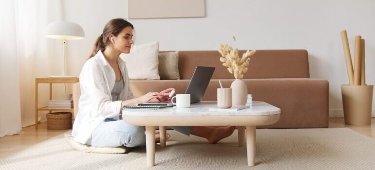 person by a computer doing research