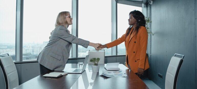 two people shaking hands