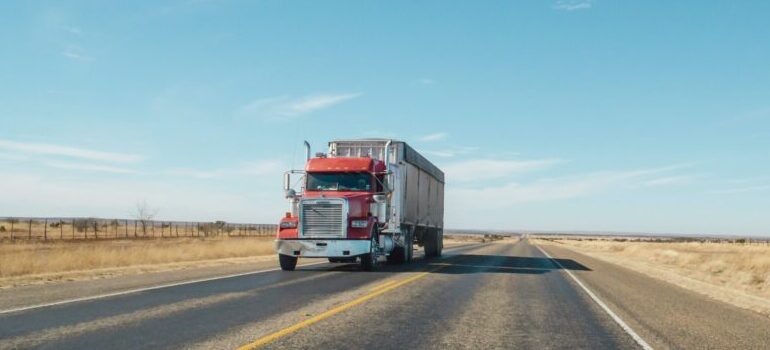 a truck from cross country movers Badger on the road