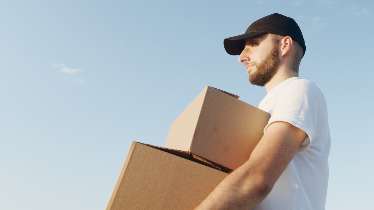 A mover carrying boxes