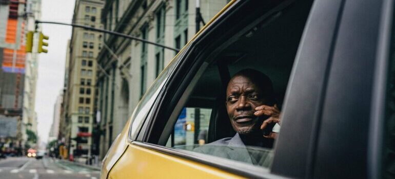 A man in an NYC taxi