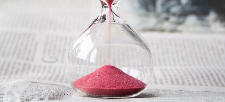 hourglass with red sand