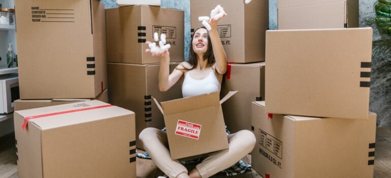 Girl surrounded by boxes