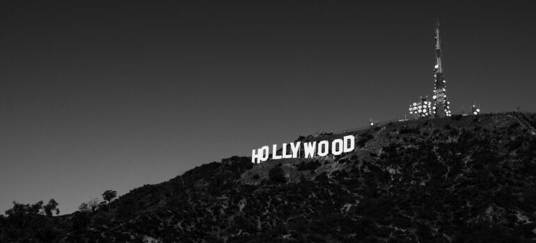 A black and white photo of the Hollywood sign.