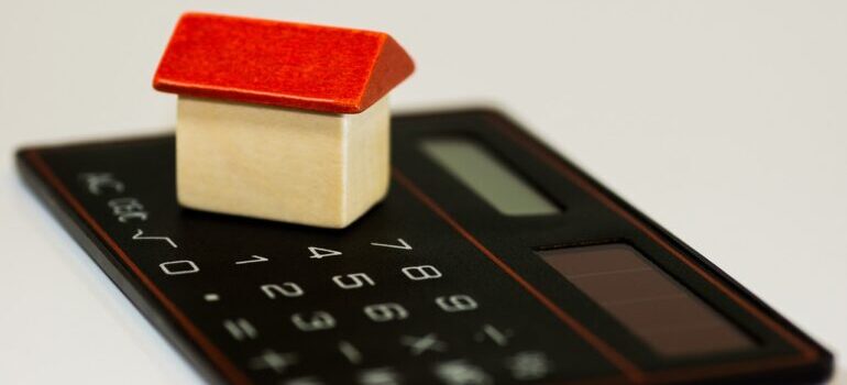 A model of a house on a calculator.