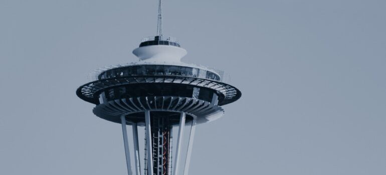 a house, behind it the space needle, seattle