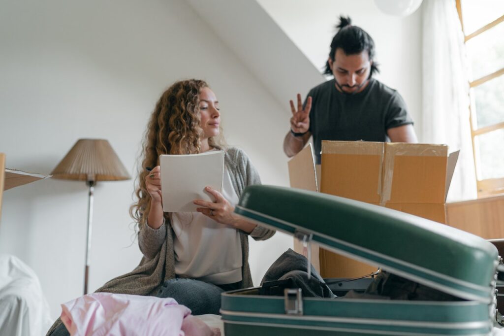 A man and a woman packing