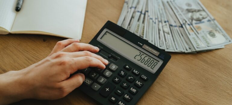 A person calculating money.