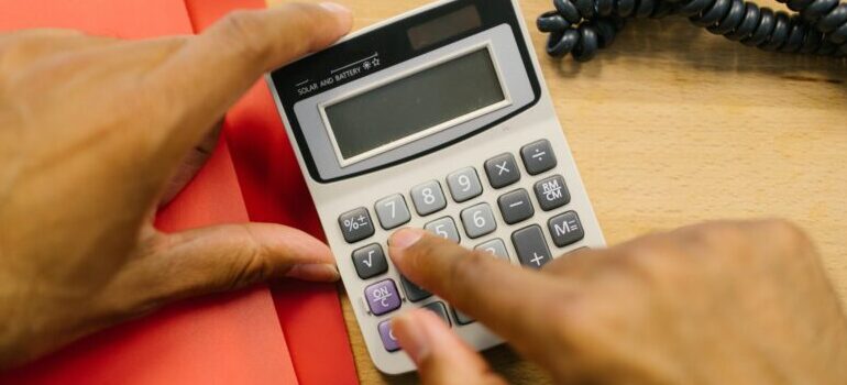 person using a calculator