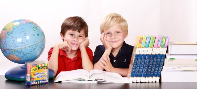 Two boys in the classroom after moving from Glendale to Chandler