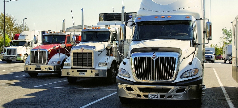 trucks belonging to long distance movers Dickinson