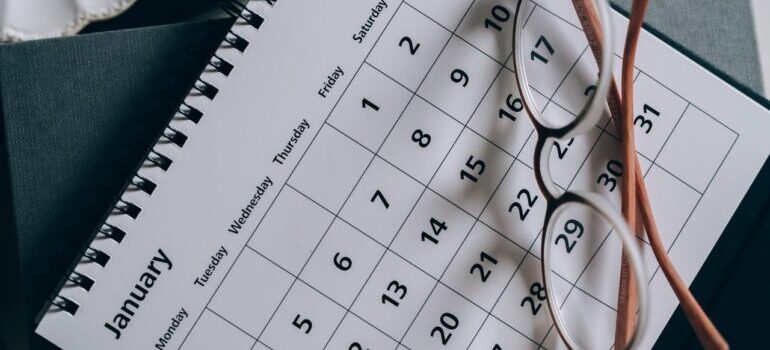 Calendar with glasses on top