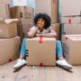 A woman with carton boxes