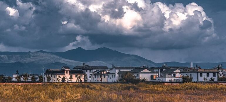 thunderclouds over a village