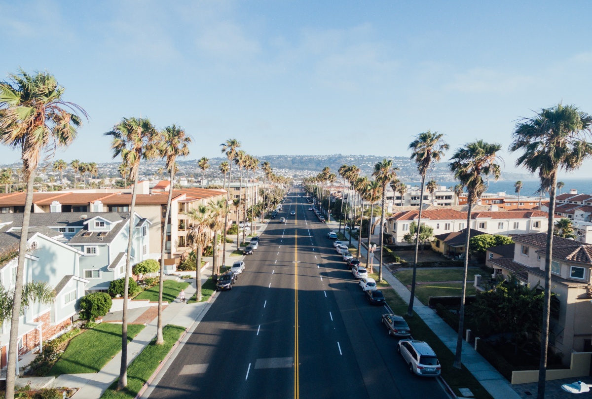 A street in California surrounded by palm trees